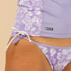 Tee Shirt Anti UV Surf Top 500 Manches Courtes Femme Parme Et Floral SELVA -Magasin De Vêtements De Sport tee shirt anti uv surf top 500 manches courtes femme turquoise et blanc 3